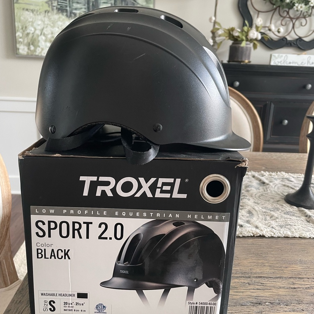 Troxel youth horseback riding helmet size small, black color.